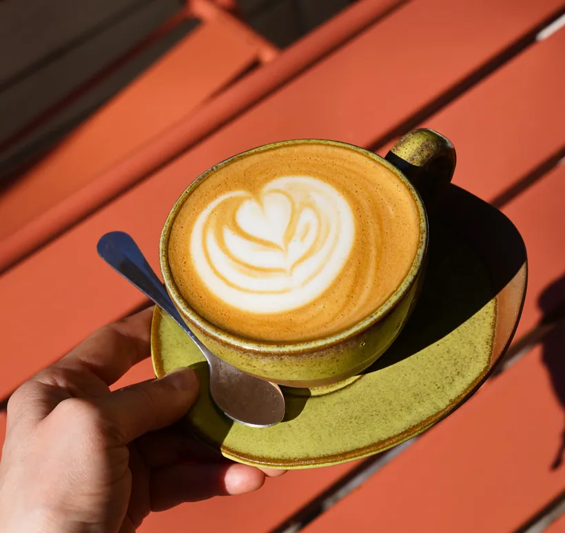 Specialty flat white in a handmade ceramic cup